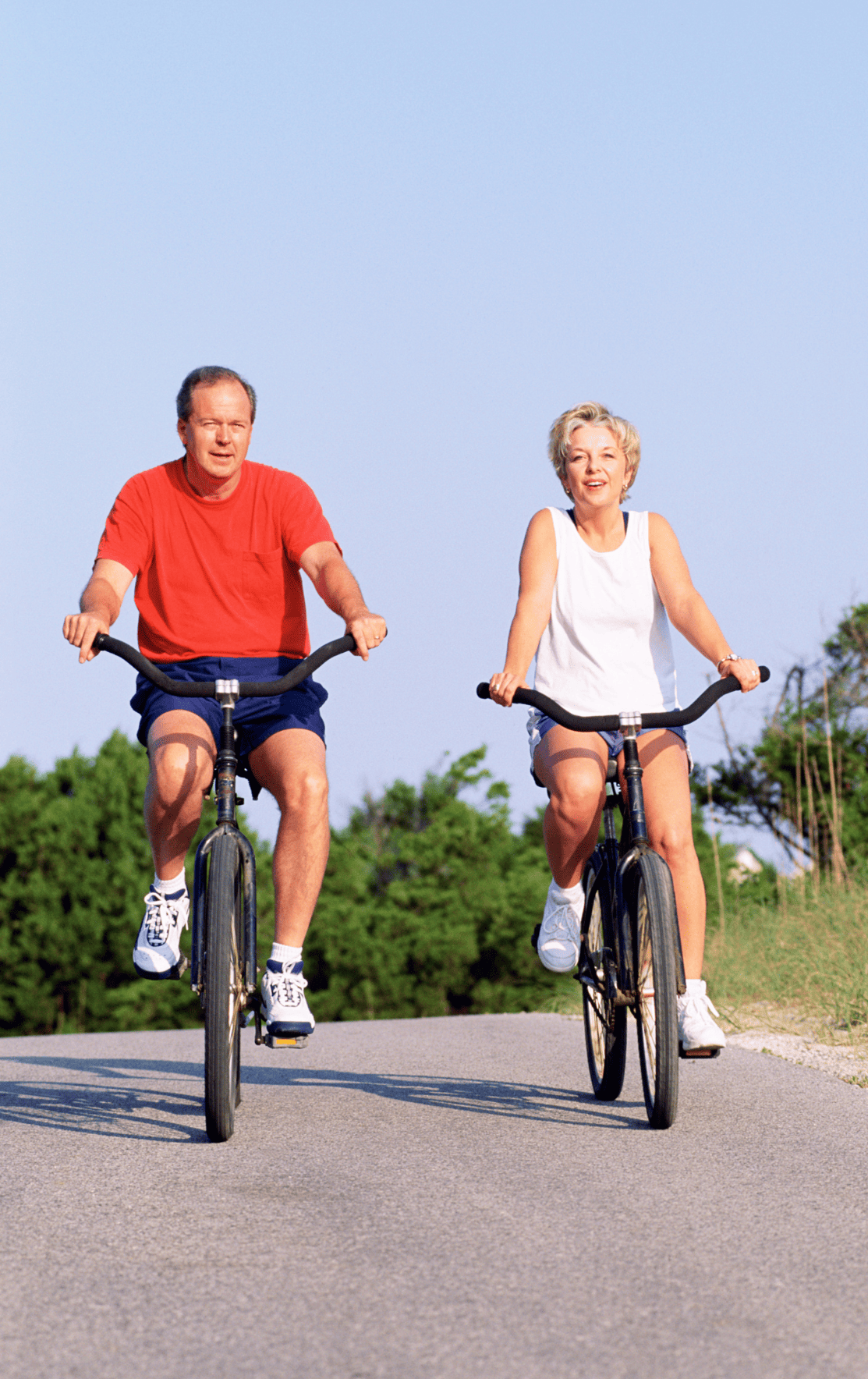 Enjoying life to the full - couple riding bikes